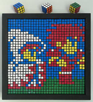 Rubik's cubes as pixel art of White Mage and Fighter from Final Fantasy.