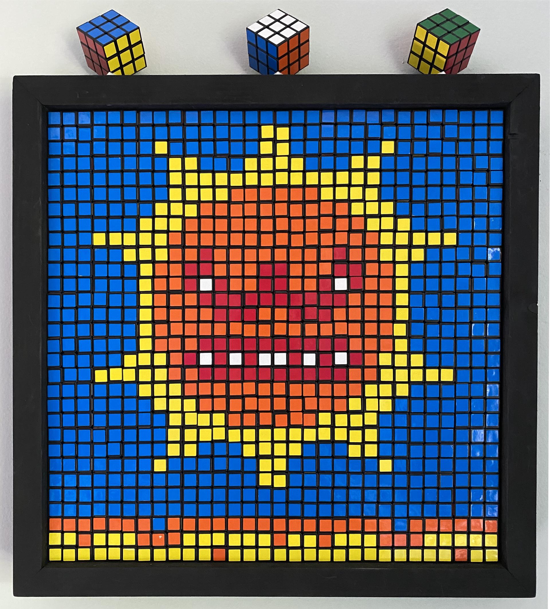 Rubik's cubes as pixel art of the angry sun from Super Mario 3.