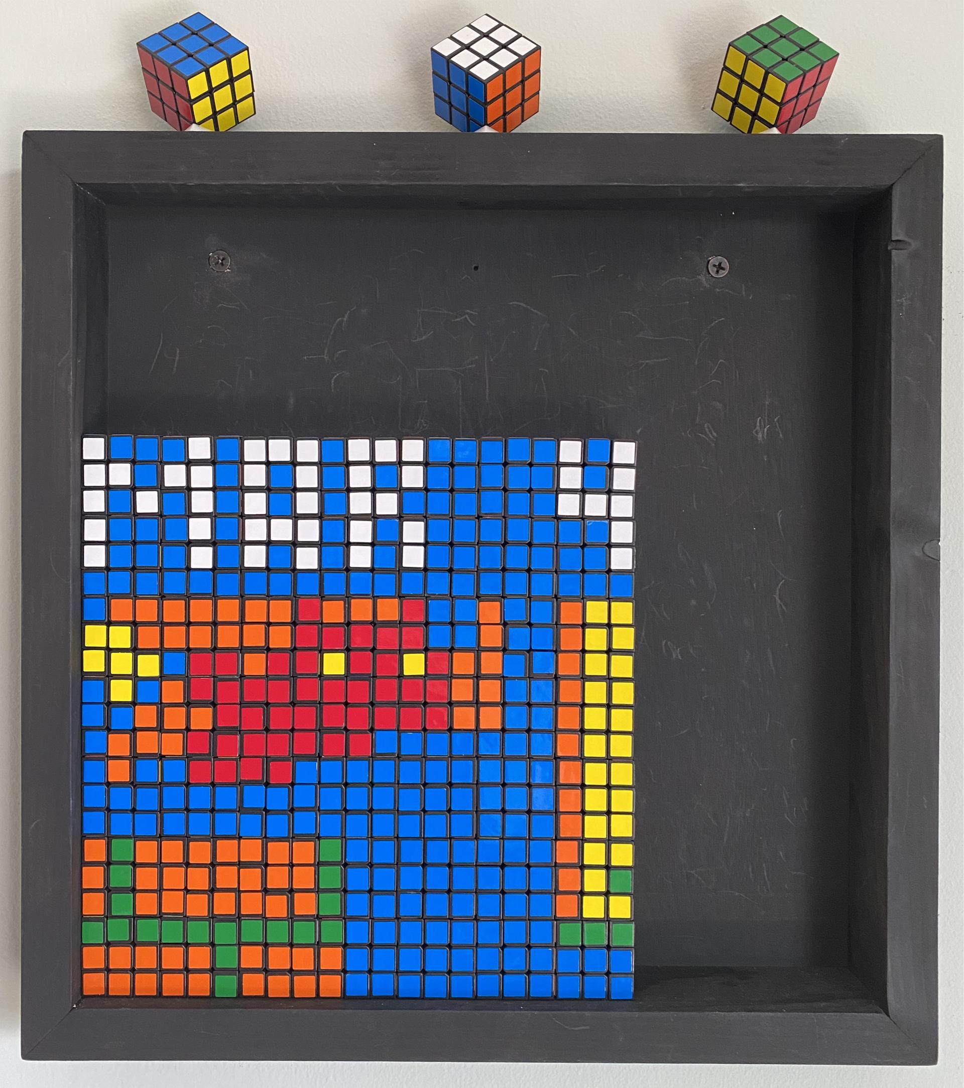 Partially built Rubik's cubes as pixel art of Super Mario jumping up to a question block for Mar 04